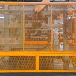 Distribution center with commercial fence perimeter and controlled gate access